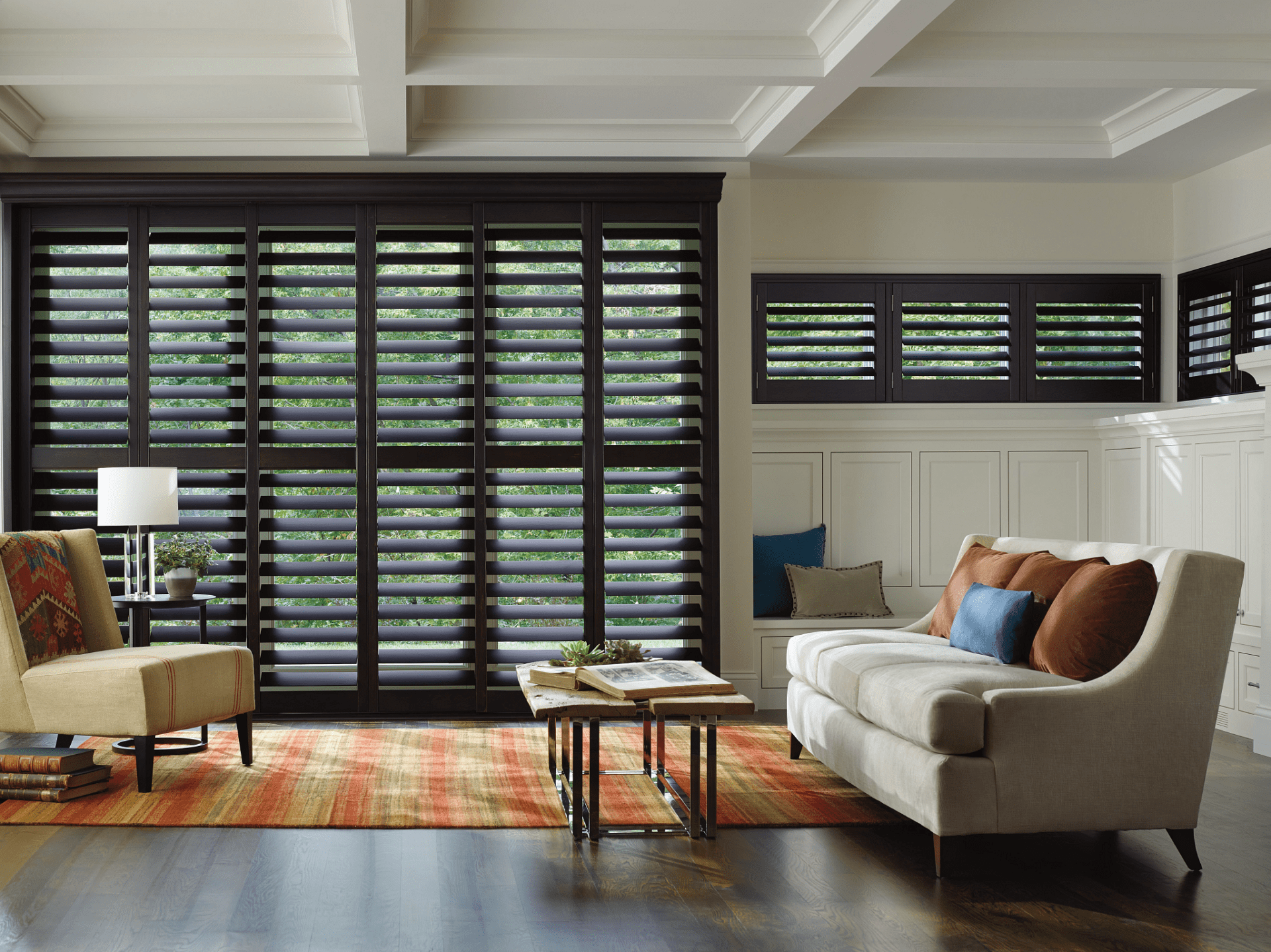 Espresso Hardwood Shutters in a living room.
